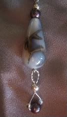 teardrop dragonskin w black pearl